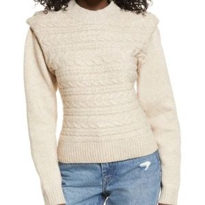 Blank NYC beige cable knit crew neck sweater with exaggerated shoulders.
